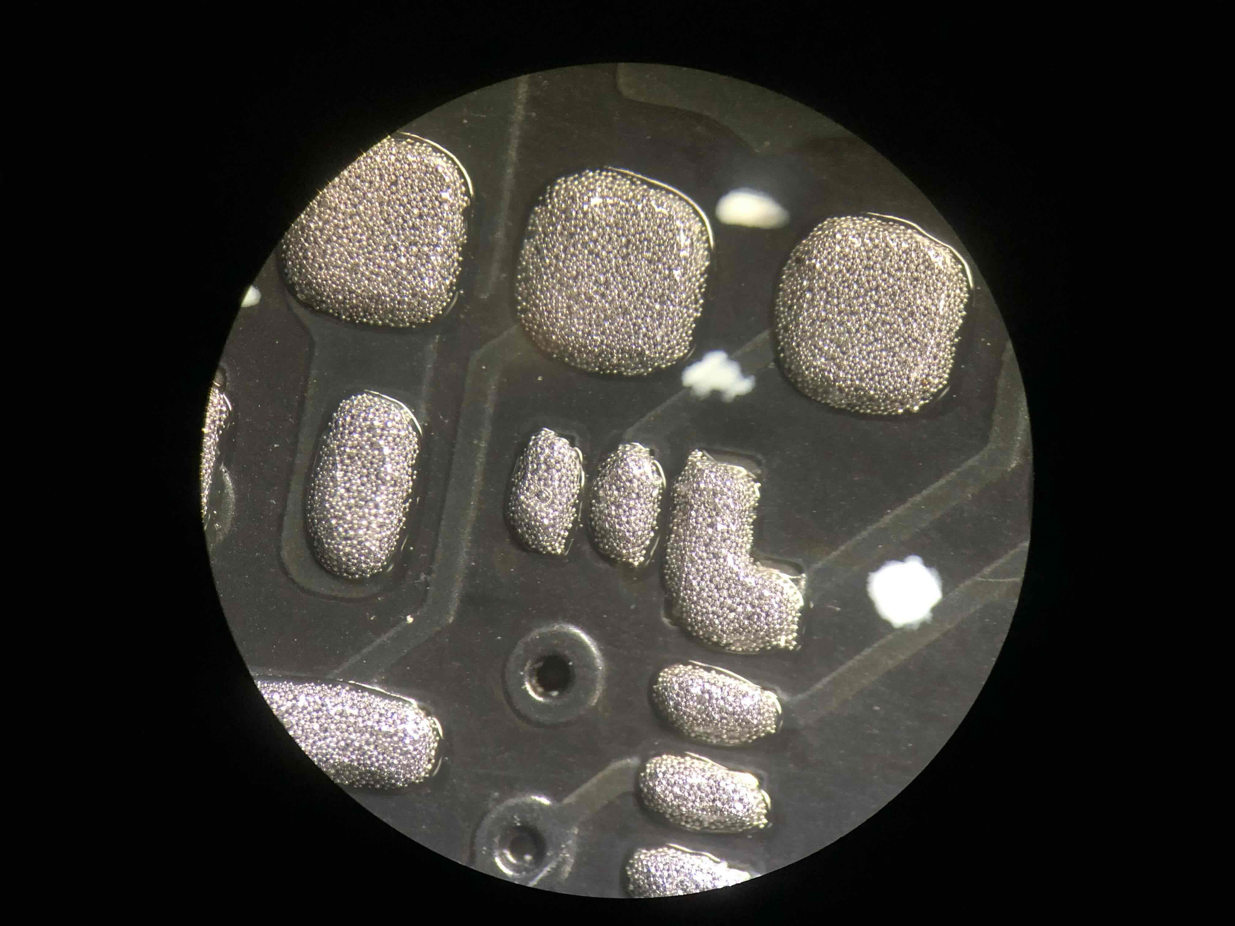 I like how the solder balls suspended in flux look.